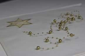 Perełki złote na żyłce silikonowej Ø7mm długość 1,3 m